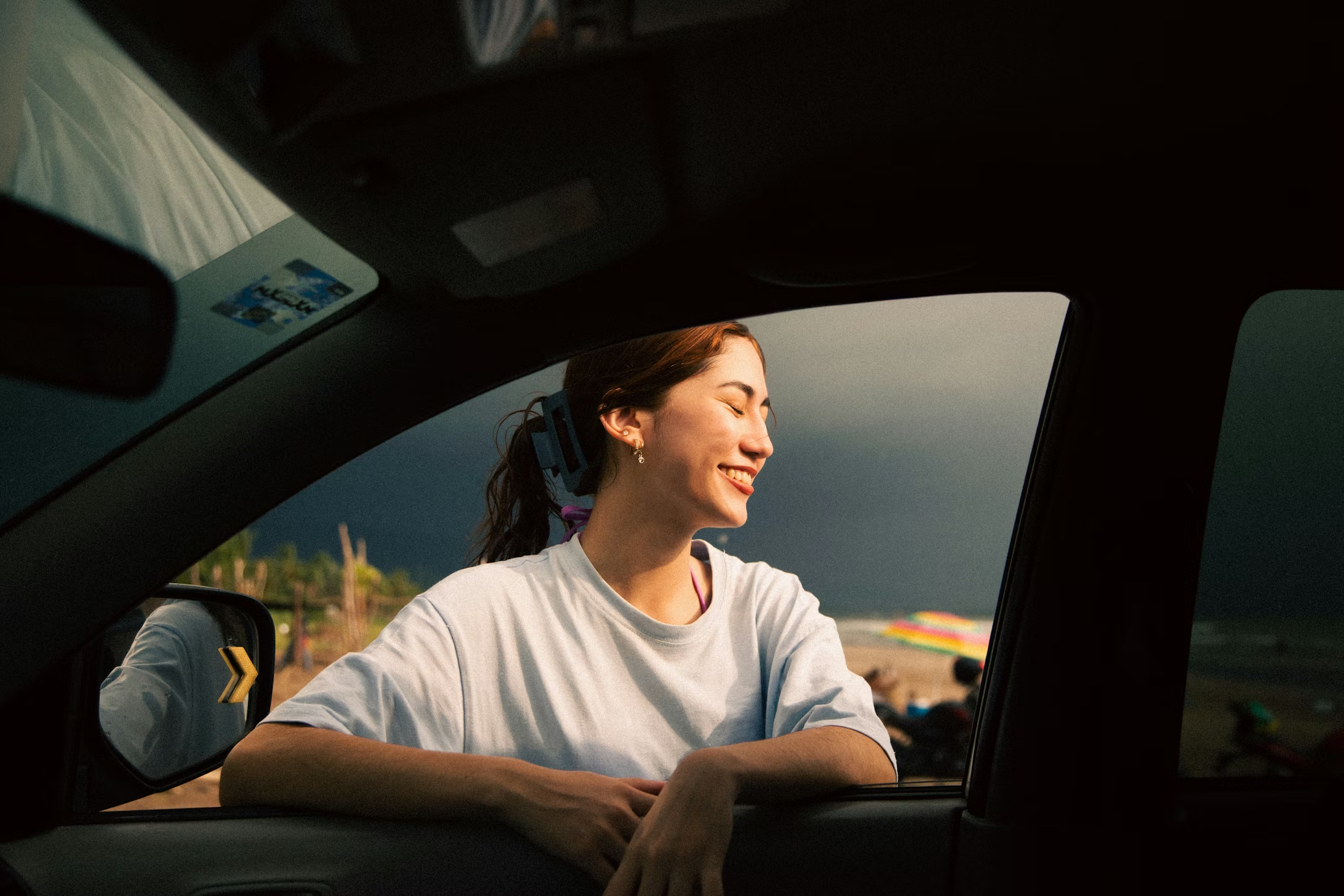 A person in a moment of quiet confidence: the financially fearless generation.
